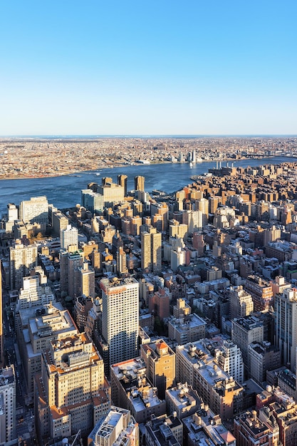 Aerial view of Manhattan and Brooklyn, New York City, USA. Skyline with skyscrapers. Williamsburg, East River.