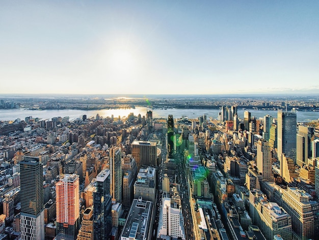 Aerial view to Midtown district of Manhattan in New York. Hudson river is on the background.