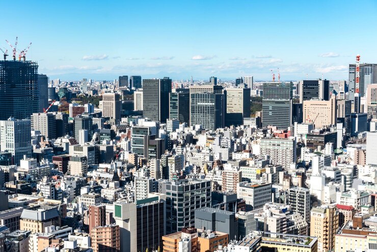 Photo 空から見た街の近代的な建物と空