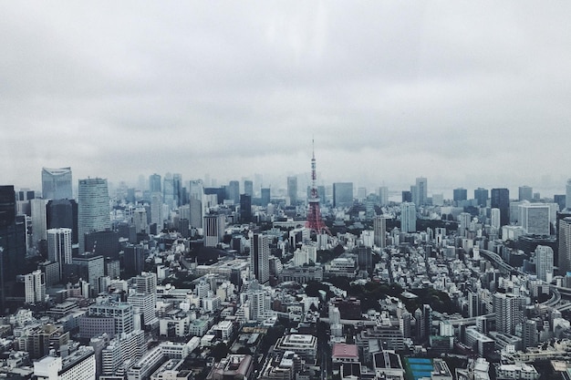 Photo aerial view of modern buildings in city against sky