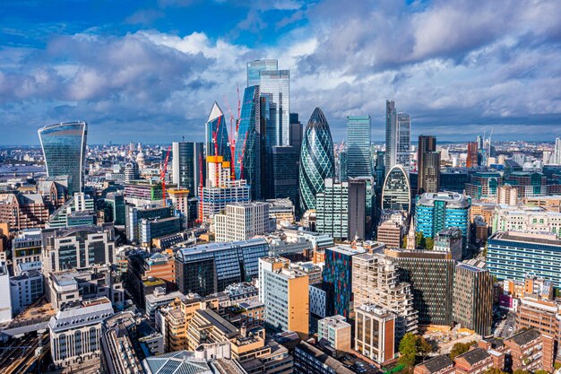 Aerial view of modern buildings in city against sky