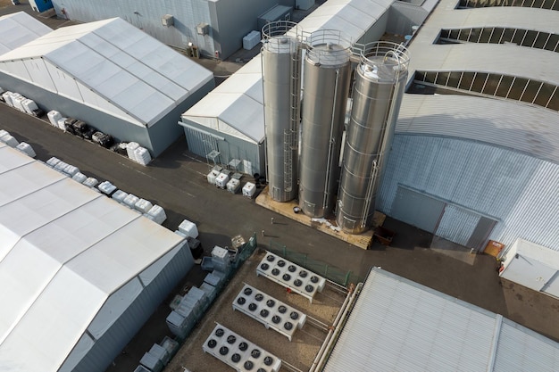 Aerial view of modern factory structure for production and\
distribution of industrial equipment concept of global\
industry