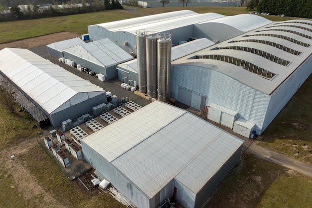 Aerial view of modern factory structure for production and distribution of industrial equipment Concept of global industry