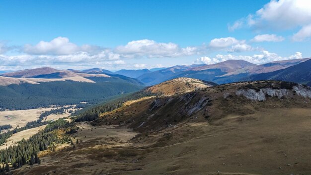 Aerial view over mountain landscape in Parang mountains in Romania.