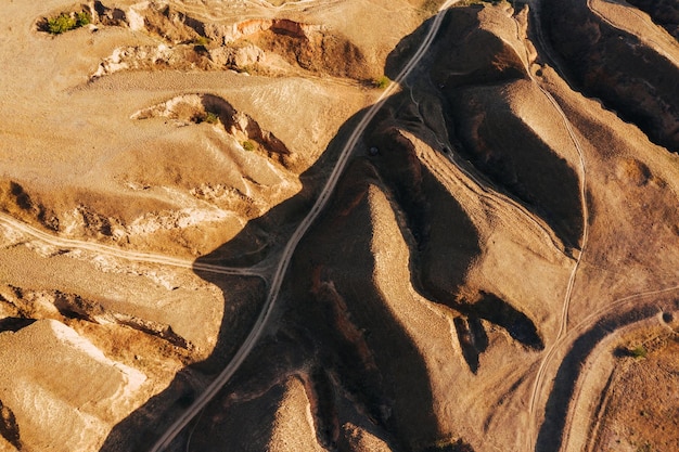Aerial view of mountain and roads at daytime natural sunlight