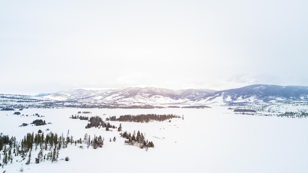 Aerial view of mountains and Dillon Reservoir in the Winter.