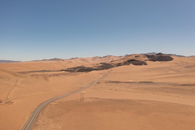 Aerial view of mountains and a road in the atacama desert near the city of Copiapo Chile