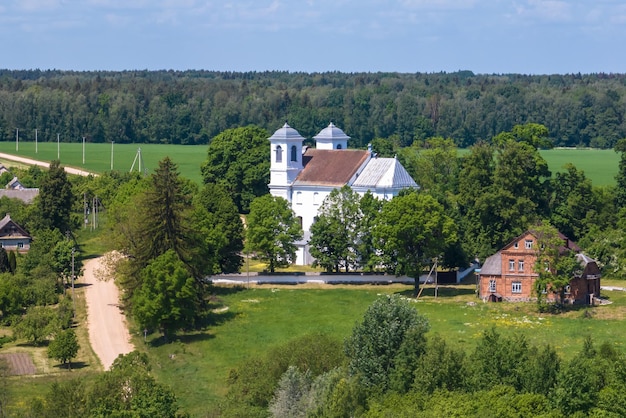 Aerial view on neo gothic or baroque temple or catholic church in countryside