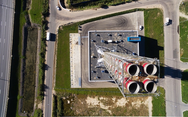 Aerial view of new modern gas boiler-house near the road track