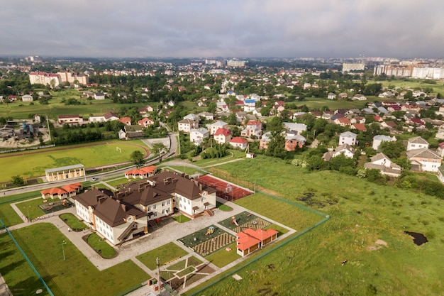 Aerial view of new preschool building in residential rural area.