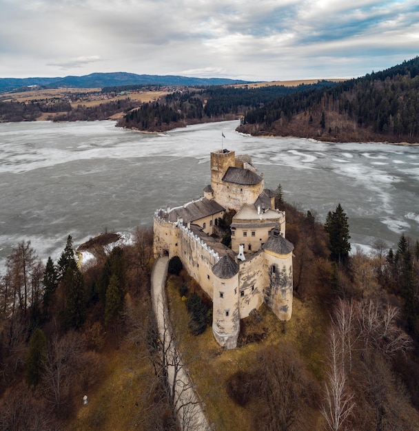 Aerial view of the Niedzica Castle (or Dunajec Castle) by the lake Czorsztyn, Poland, at early spring