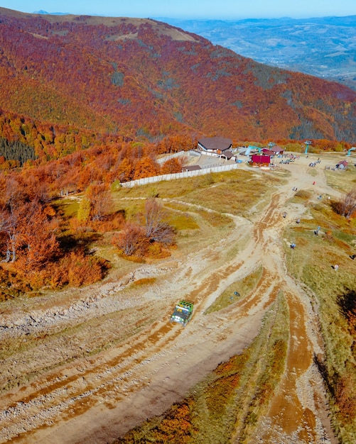 Aerial view of off road attraction road to the top of carpathian mountains