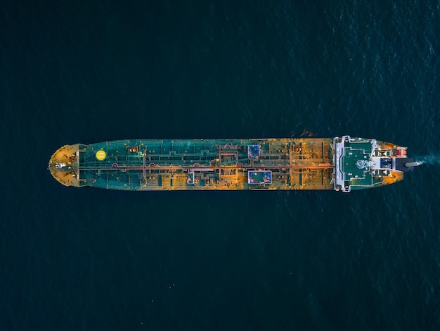 Aerial view oil ship tanker carrier oil on the sea at sunset