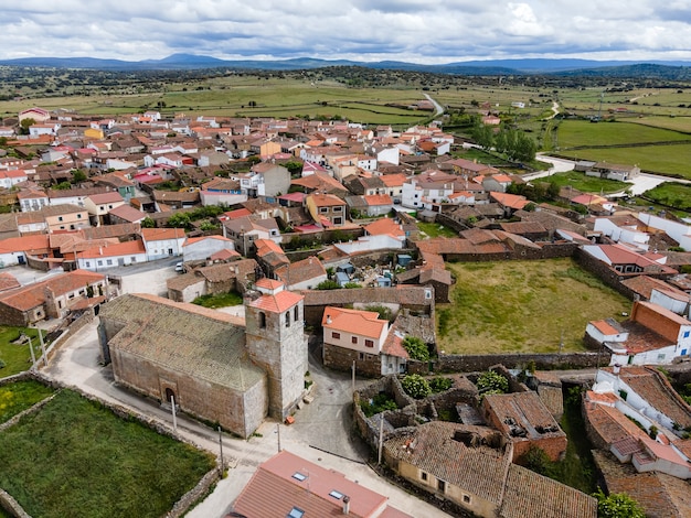 Aerial view of old town with stone houses and old church