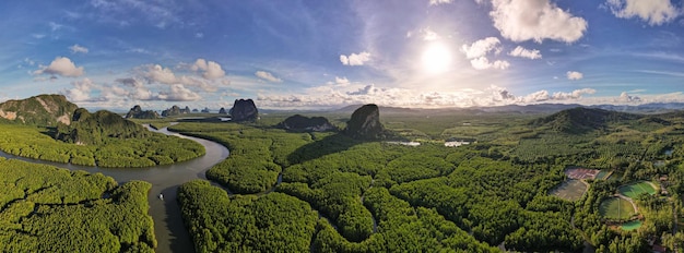 Aerial view panorama drone shot of nature landscape mountain\
view located in phangnga thailand drone flying over sea and\
mangrove forest landscape high angle view