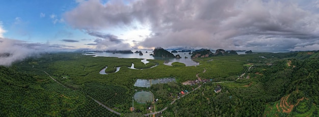 Aerial view panorama Drone shot of Sametnangshe landscape view located in Phangnga ThailandDrone flying over sea and mangrove forest LandscapeHigh angle view nature landscape