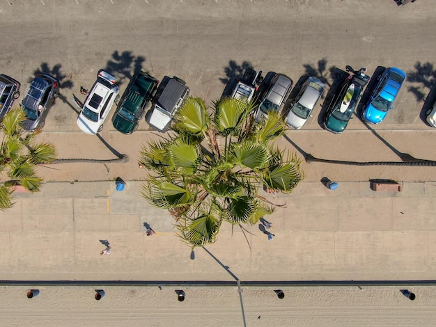 Aerial view of parking lot with cars in front of the beach ocean, La Jolla. San Diego