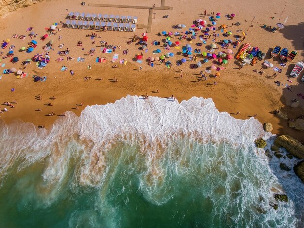 Aerial view of people enjoying at beach