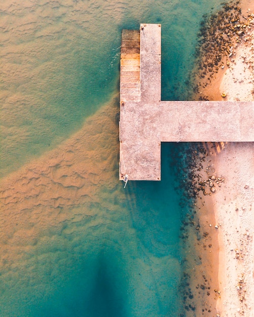 aerial view of pier at shore