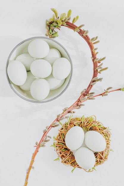 Aerial view of raw eggs on a white marble table