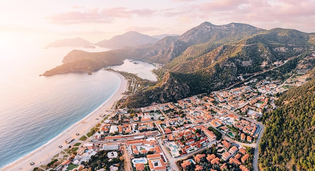 Aerial view of a resort town Oludeniz in Turkiye at sunset Travel landmarks and destinations