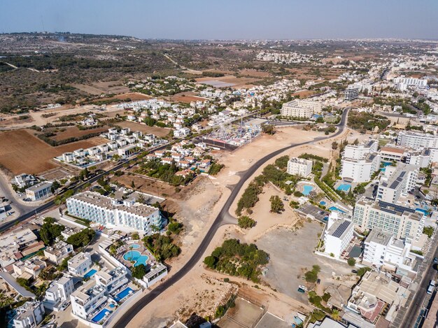 Aerial view of resort town with blue sea