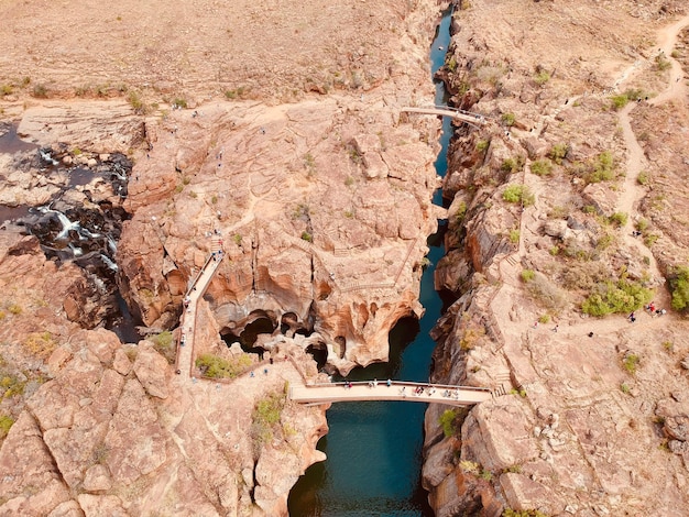 Aerial view of river amidst rock formations