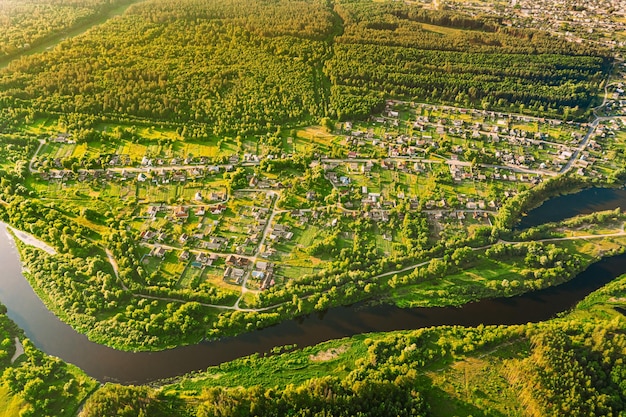 aerial view of river flowing through forest