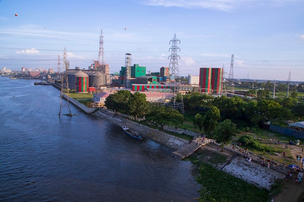 Aerial view of the river and industrial area with blue sky in NarayanganjBangladesh