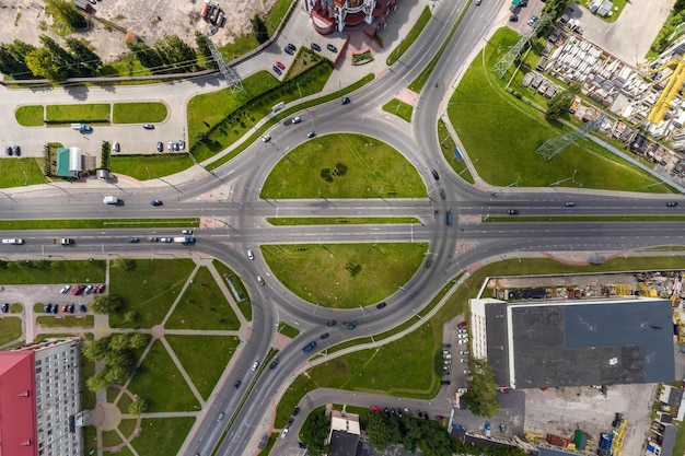 Aerial view of road interchange or highway intersection Junction network of transportation taken by drone