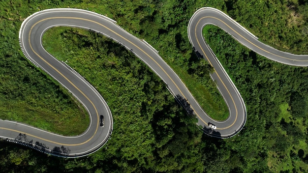 Aerial view ROAD No1081 of winding mountain road between Pua Ddistric Nan Province Thailand