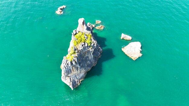 Aerial view of rock islands in the turquoise waters of the Andaman Sea Thailand