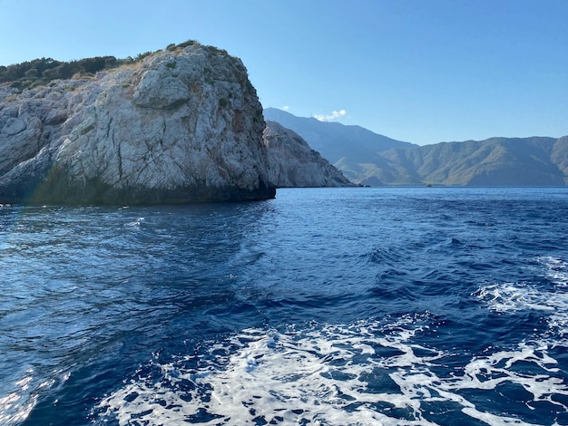 Aerial view of the rocks and blue water of the Black Sea in the Crimea