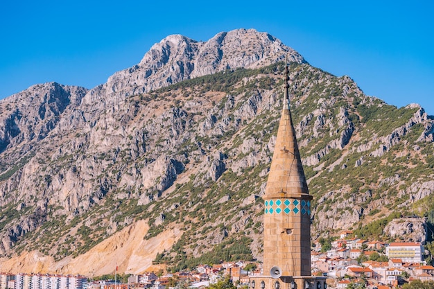 Aerial view over rooftops and mosque minaret in Egirdir Isparta province in Turkey Travel sightseeing and religious tourism