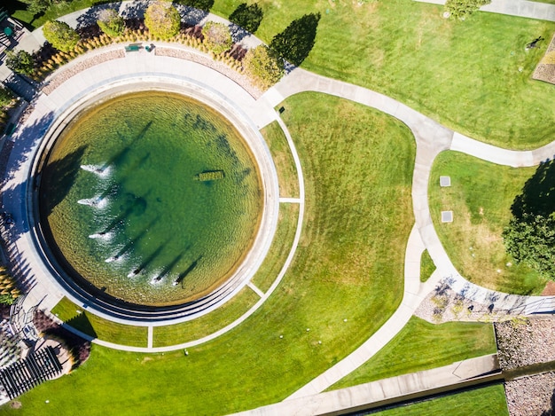 Aerial view of round fountain newar road intersection.