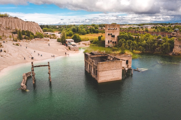 Aerial view of the Rummu abandoned prison Tallinn Estonia lake beach. Beautiful view of the lake.