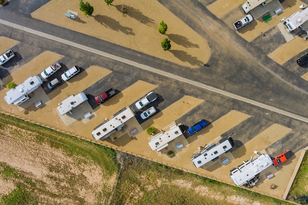 Photo aerial view of rv campground with travel trailer parking camping resort area park