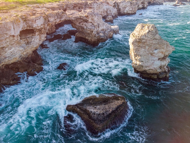 Aerial view of sea waves and fantastic cliffs rocky coast Tyulenovo Bulgaria