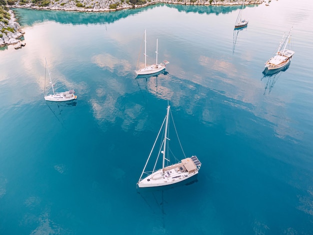 Aerial view of seacoast with many yachts and sailing boats