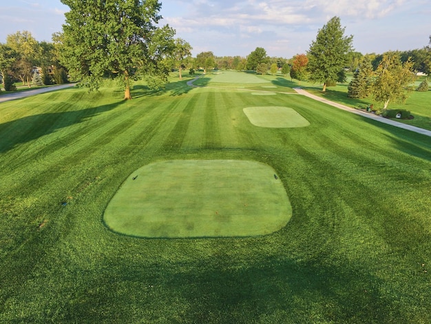 Aerial View of Serene Golf Course with Lush Fairways and Trees in Fort Wayne