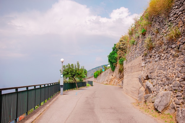 Aerial View of Serpentine Roads at the Amalfi Coast close to the Sea