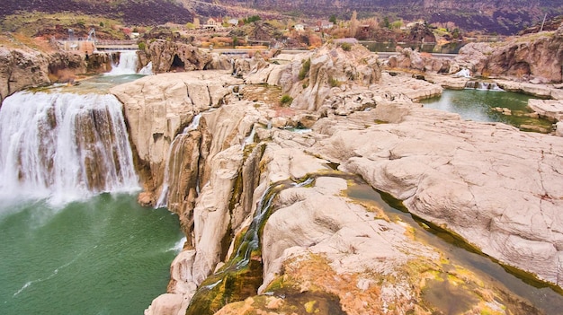 Aerial view over shoshone falls in idaho by cliffs