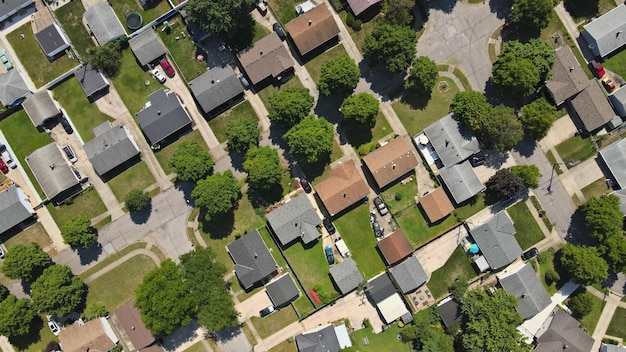 Aerial view of small town houses on road at landscape from above of the residential area