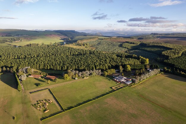 Aerial view of sporting fields and clubhouse with soft vibrant afternoon light