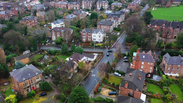 Aerial view over suburban homes and roads in Birkenhead UK