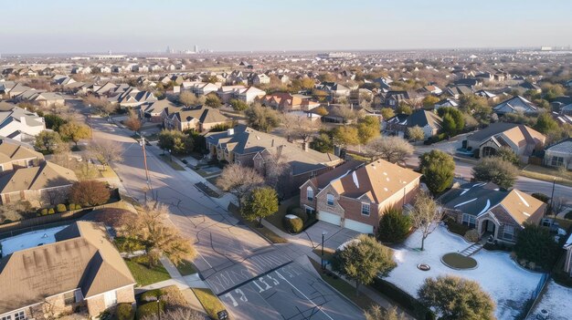 Aerial view of a suburban neighborhood in Dallas showing houses and trees on a winter day