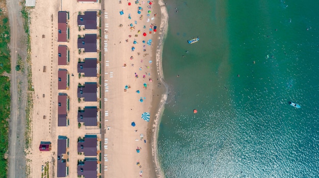 Aerial view of sun rising over sea.