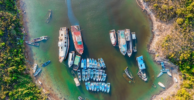 Aerial view of sunk ships in the coastline