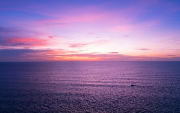 Aerial view sunset sky Nature beautiful Light Sunset or sunrise over sea Colorful dramatic majestic scenery Sky with Amazing clouds and waves in sunset sky purple light cloud background