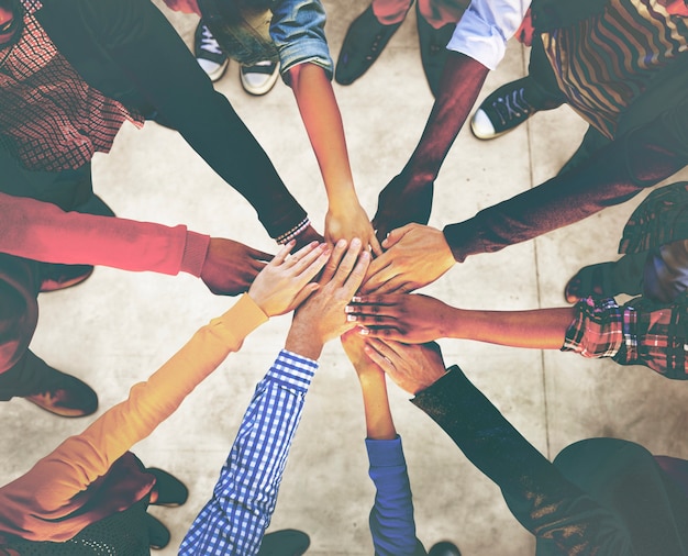 Aerial view of supported hands out together